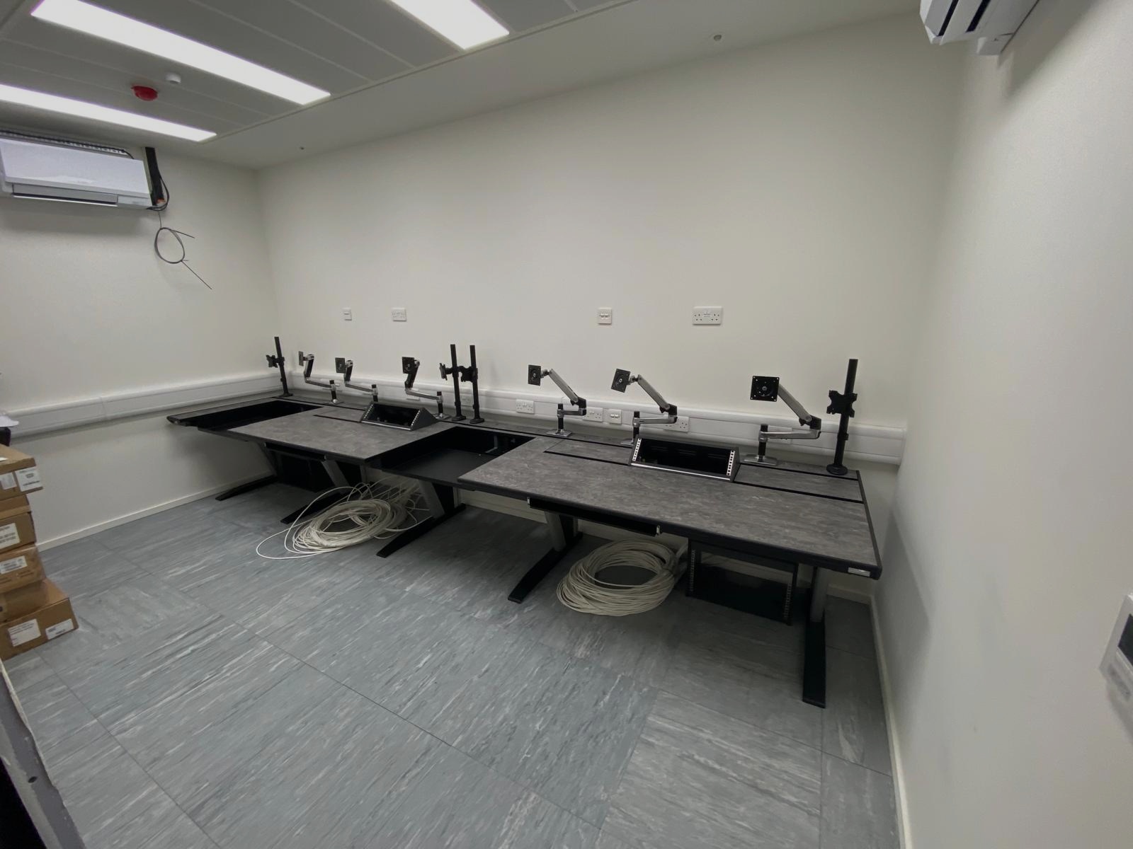 Executive boardroom AV suite at a Qatari government ministry